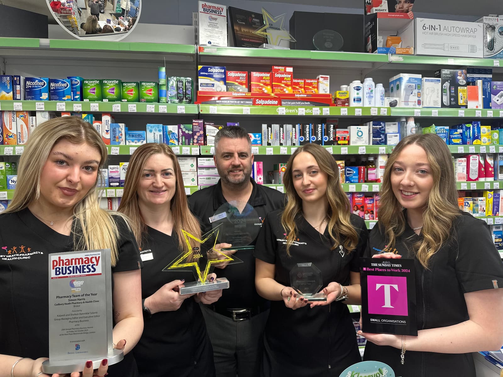 The Cadbury Heath Pharmacy team with their awards